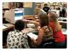 Student working with teacher.